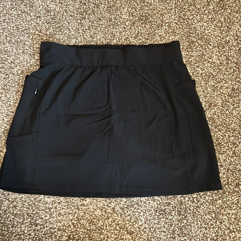 Black athletic skirt with biker shorts, size medium
